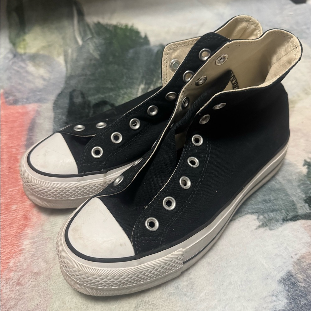 Black High-Top Converse Sneakers